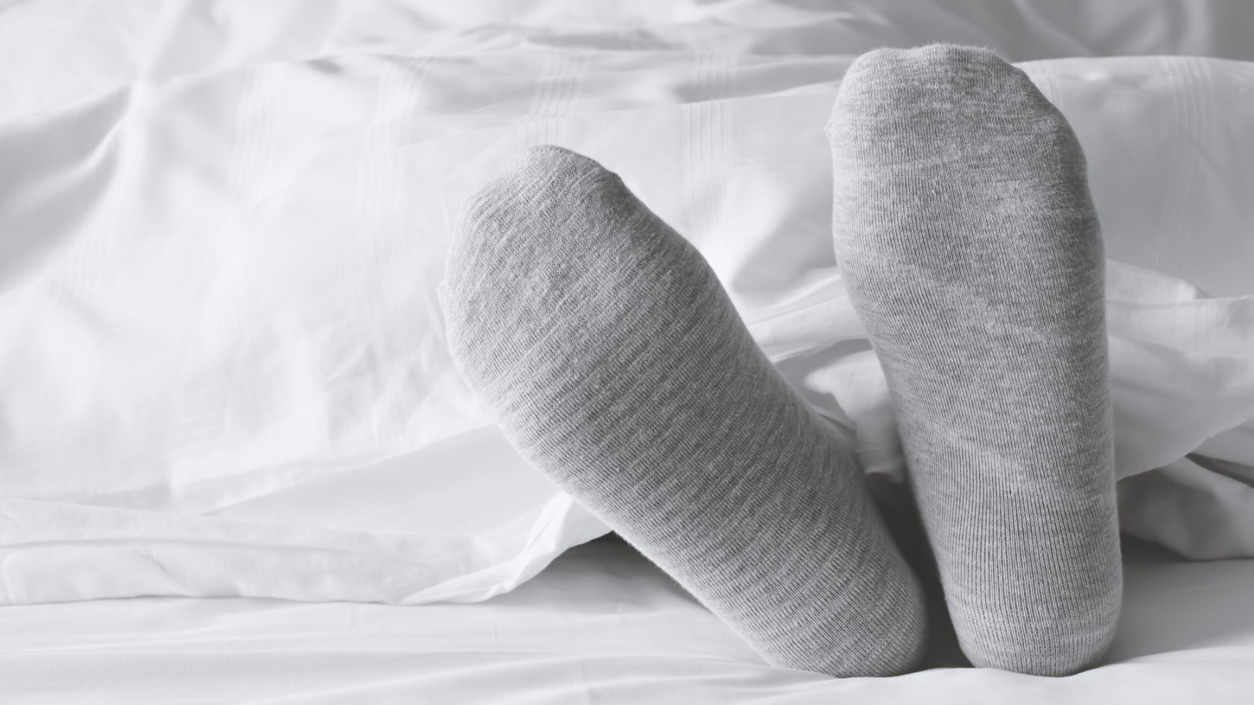 Sleeping with socks on isn&#039;t just because you&#039;re cold—psychologists reveal what it says about your personality and hidden emotional needs