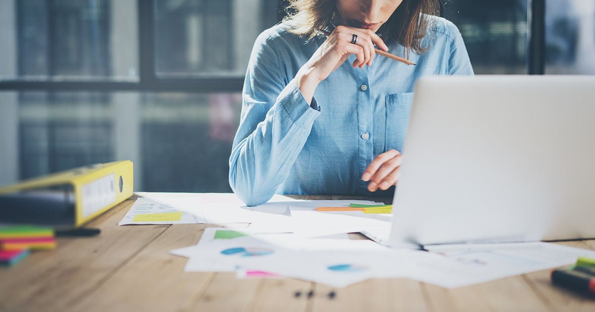 Young architect work project. Photo woman working with new startup project in modern loft. Generic design notebook on wood table. Horizontal, film effect; Shutterstock ID 387274861